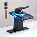Bathroom Sink Faucet | Matte Black Waterfall-Style Single-Hole Vanity Faucet (for Single-Hole Sinks) | Includes Metal Pop-Up Drain & 2 Supply Hoses | Open Glass Spout Design